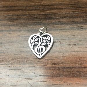 Retired James Avery treble clef charm